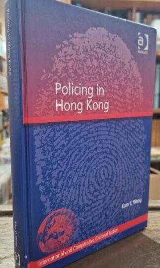 Policing in Hong Kong (International and Comparative Criminal Justice) : Kam C. Wong