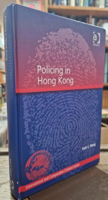 Policing in Hong Kong (International and Comparative Criminal Justice) : Kam C. Wong